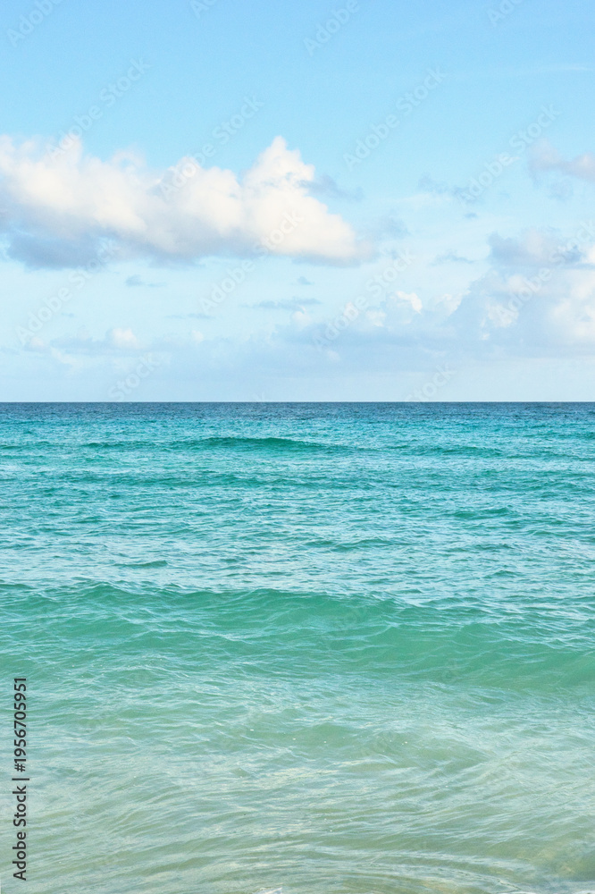 Fototapeta premium Varadero, Cuba; 04.07.2023. Beautiful, colourful sunset on the beach in Varadero, Cuba! Cote d'Azur of the Atlantic Ocean, next to the Caribbean Sea. Cuba wild palm beach background. Nature blue sea l