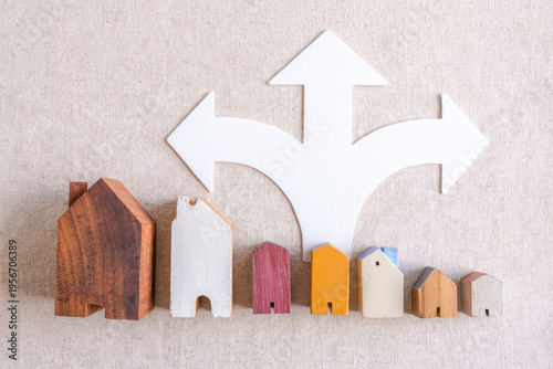 Konstfotografi Real estate, house, choice, decision, arrow, direction, home representing property investment options and relocation strategy on a neutral linen background for mortgage planning
