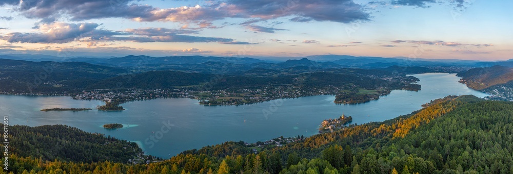 Fototapeta premium Sunset panorama view of Worthersee in Austria