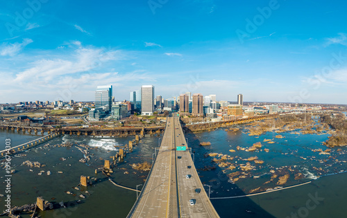 Obraz na plátně Richmond, Virginia, aerial panorama of the Manchester Bridge spanning the James River with the downtown city skyline in the background