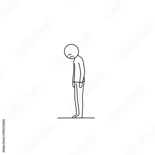 Man Standing with Head Bowed Downwards.