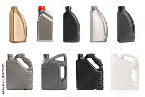 Collection of various plastic motor oil bottles and gallon jugs in black, grey, gold, and white, isolated on a white background.