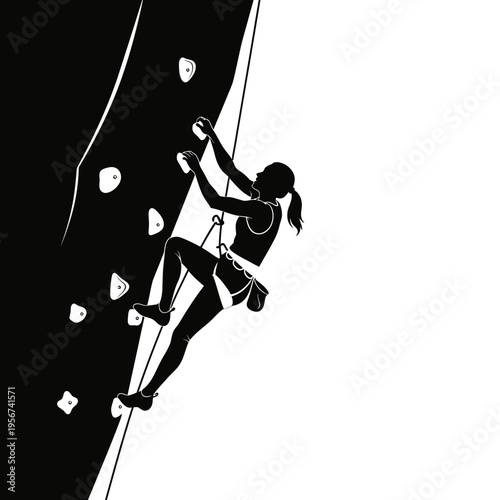 A woman climbs an indoor rock wall with determination and strength.