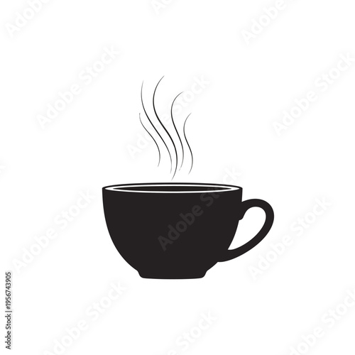 A steaming hot cup of coffee is served in a simple mug indoors.