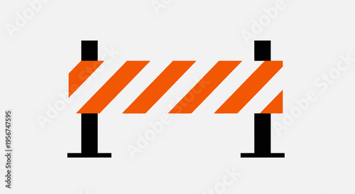 Orange and white striped road barrier.