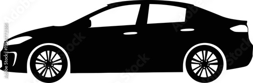 Efficient compact sedan driving through suburban neighborhood