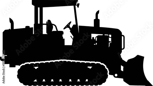 Powerful construction bulldozer clearing land for a new project