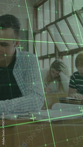 Vertical video: Camera panning left, student writing, green grid overlay tracking focus during exam