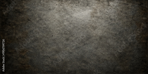 A dark grunge metal texture with a rough black concrete surface and aged vintage paper patterns for a dirty gray stone wall backdrop design