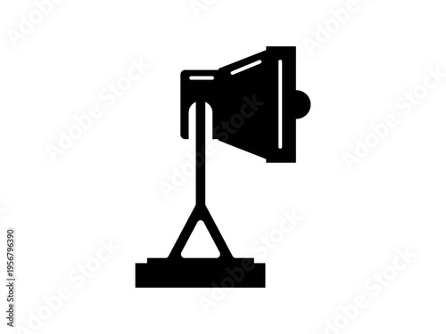 Black spotlight icon in a simple flat silhouette style.