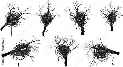 Silhouette of tangled electrical cables wrapped around tree branches showing abstract nature connection, technology concept, environmental design, creative artistic composition