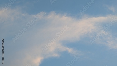 Soft Blue Sky with White Clouds Natural Background and Calm Cloudscape