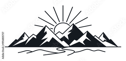 Mountain range silhouette with sun setting and river flowing through landscape