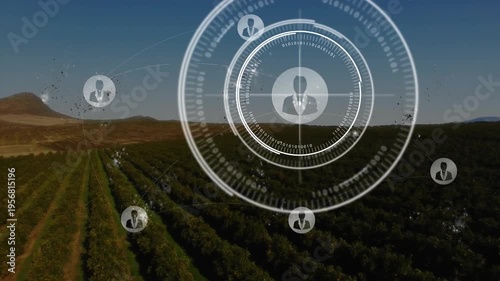 Particle clusters sparking central HUD growing above crops, forming avatar nodes mapping farm teams