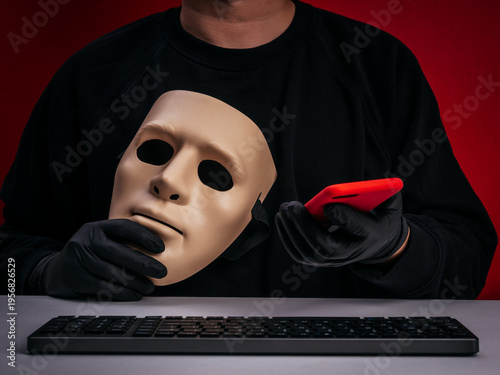 Online scam concept showing anonymous criminal or hacker wearing gloves with mask and smartphone impersonating. Phishing attack, identity theft, digital fraud and cybercrime threat on red background.