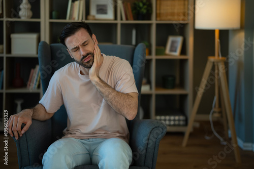 Man feeling severe toothache suffering excruciating dental pain