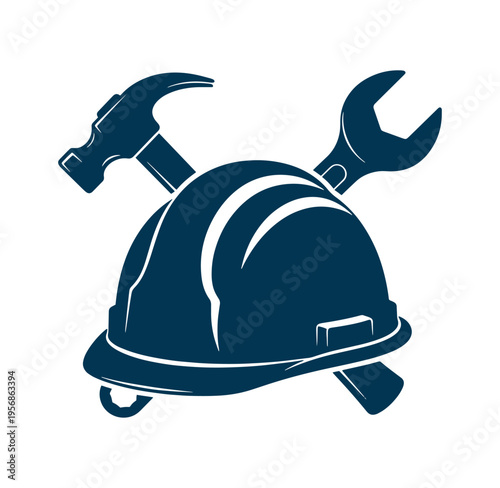 Construction hard hat with hammer and wrench crossed behind  industrial safety equipment