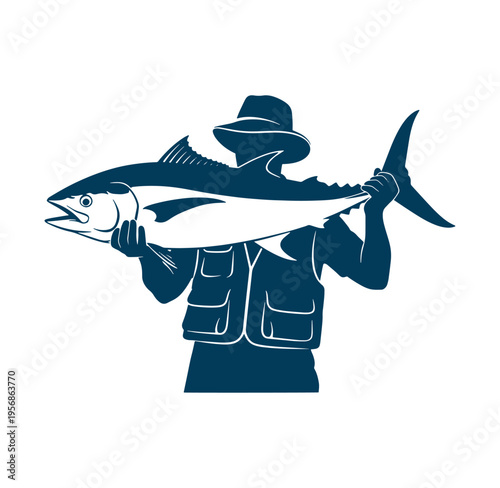Man holding a large tuna fish in his hands while wearing a hat and life jacket