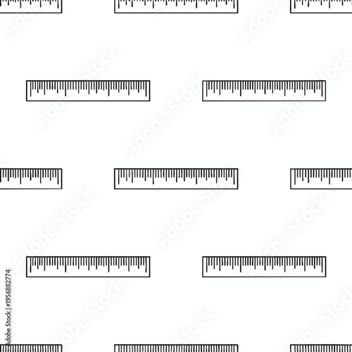 A repeating pattern of black and white rulers on a white background