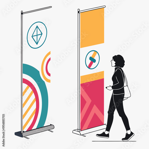 A woman walks past two colorful roll up banners