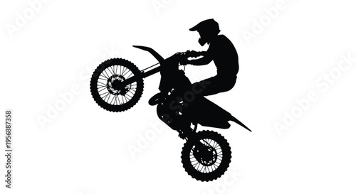 Motocross rider performing a wheelie dynamic action sports silhouette