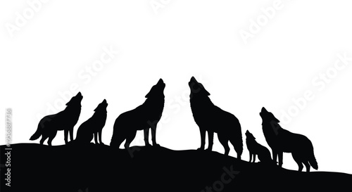 A pack of wolves howling at the moon dramatic silhouette