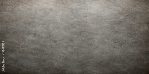 A dark grunge concrete wall with an aged gray stone texture and rough vintage surface creates a blank dirty backdrop for retro design