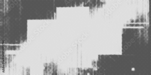 Abstract halftone texture with diagonal streaks and scattered dot patterns, creating a sense of motion and raw energy.