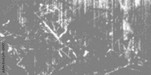 Abstract halftone background featuring dense dot patterns with subtle geometric hints and scattered light areas.