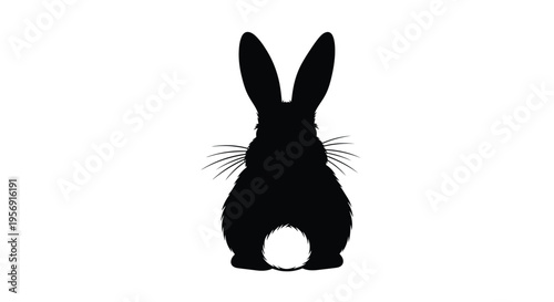 A dark detailed silhouette of a rabbit facing forward silhouette