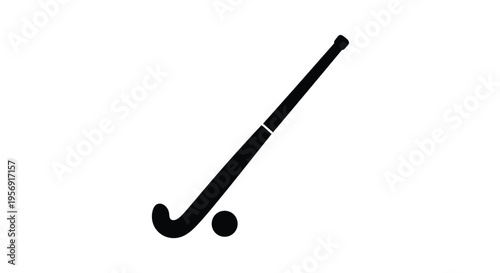 A black silhouette of a hockey stick and puck against white background