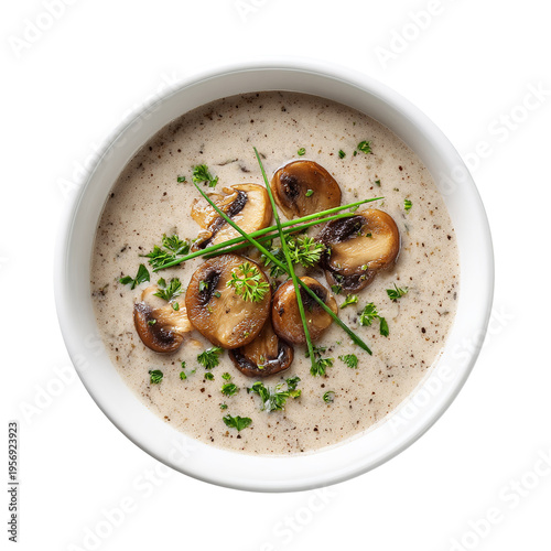 Plate with rich organic cream of mushroom soup on white background. healthy food concept