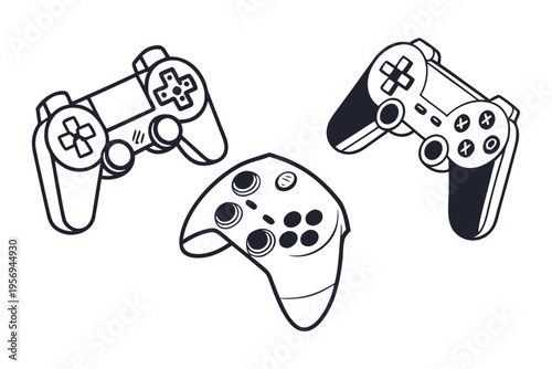 Three game controllers in black and white gamepads gaming