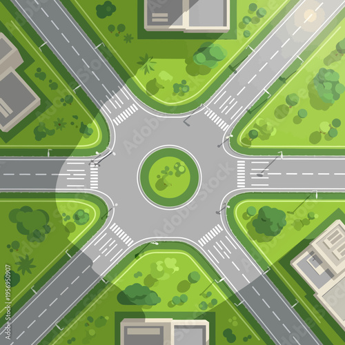 Top view of a modern roundabout intersection with roads, crosswalks, and green spaces