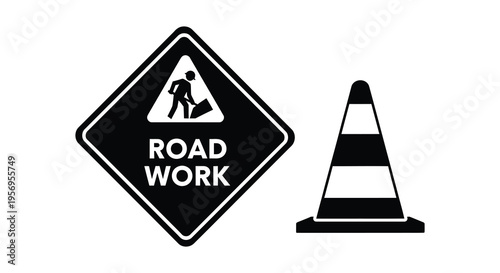 Road work sign and traffic cone depicted in a striking silhouette