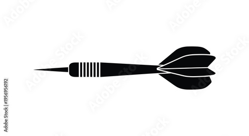 A black dart with detailed feathers shown in a stark silhouette