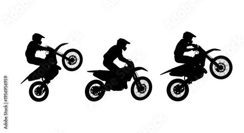 Black silhouettes of motocross riders performing various stunts on their dirt bikes in the field