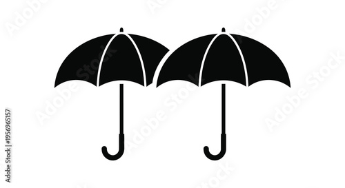 Two closed umbrellas displayed against a white background silhouette