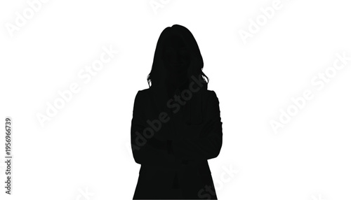 Female professional silhouette standing with long hair against a stark white background for identity.
