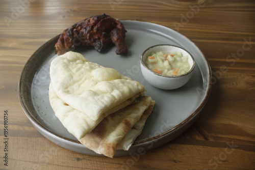Grilled Chicken with butter Naan, a typical Bangladeshi Cuisine 