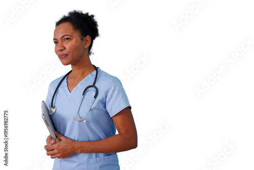 African american nurse using digital tablet for patient care, standing with stethoscope, providing healthcare services