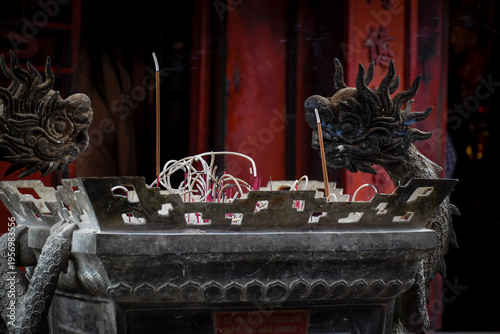 incense sticks with red background