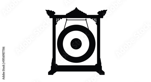 Traditional gamelan gong instrument depicted in striking black silhouette