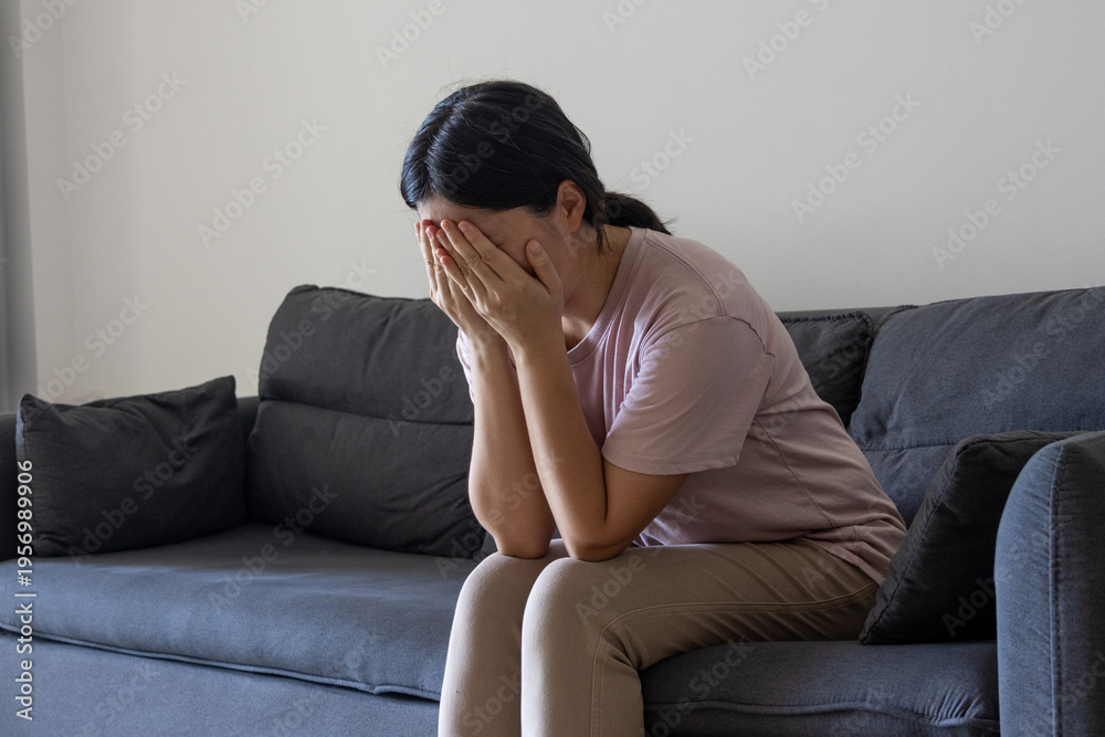 Obraz premium Fatigued Young Woman Indoors