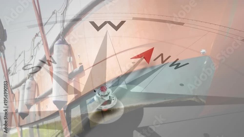 Animation of compass spinning with motivation and business text over ship