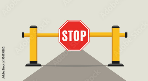 A stop sign is placed on a road barrier at a street