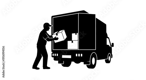 Man loading boxes into the back of a delivery truck, logistical operation