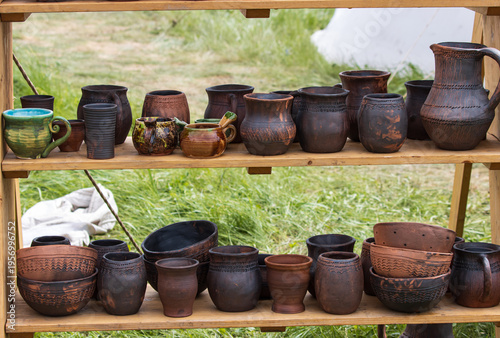 handmade clay pottery as background.