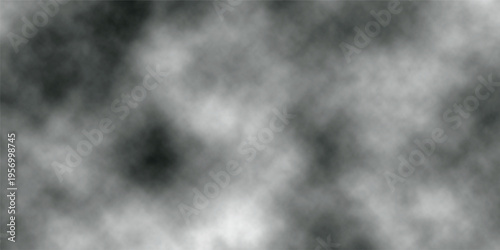A dynamic motion of abstract black and white smoke swirls through a dark misty backdrop to create a textured fog resembling a stormy night sky filled with clouds