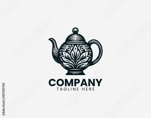 Vintage teapot with floral ornament detail in clean modern black vector logo illustration style